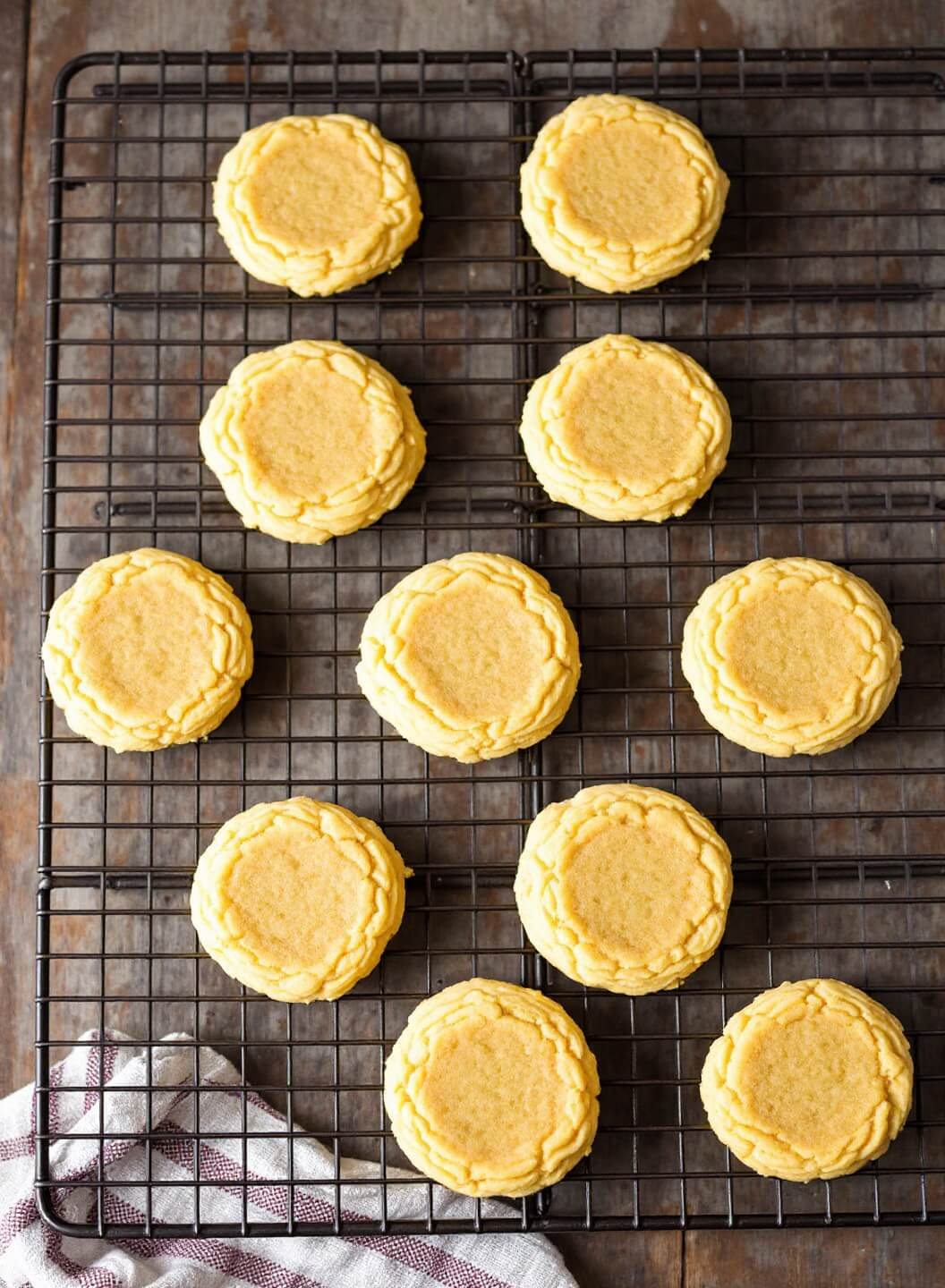 Golden cookies cooling on a wire rack