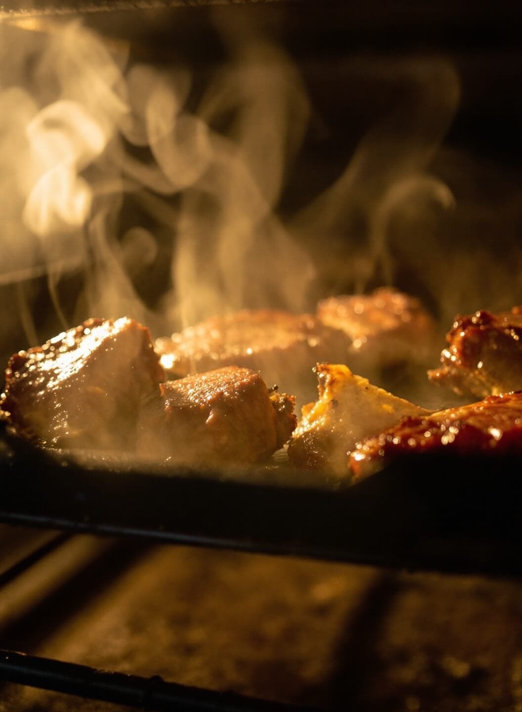 Sticky Bbq Ribs With Sugar-Free Bbq Sauce 5 Steaming oven rack with wrapped ribs during golden hour
