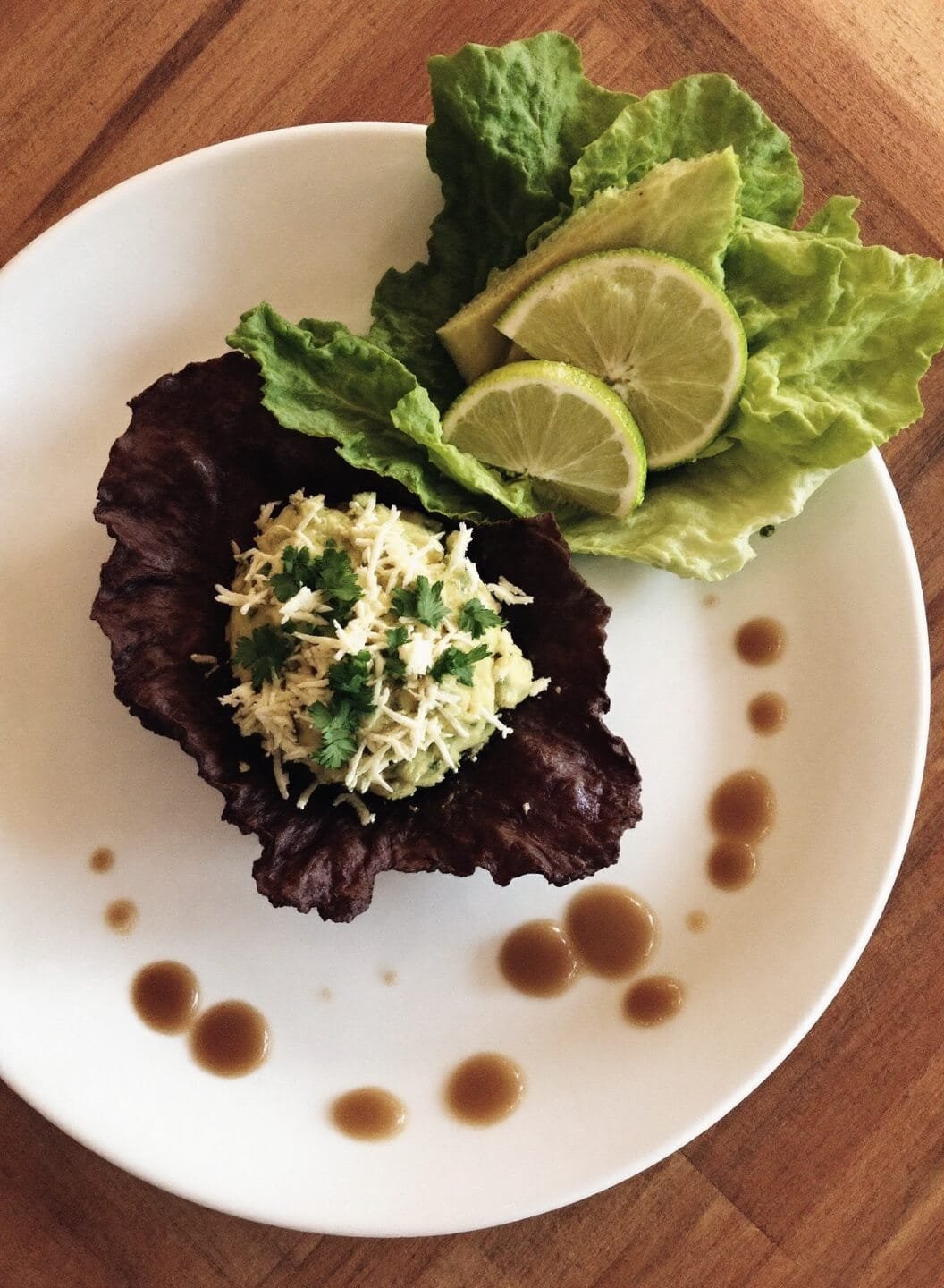 Stuffed Avocado Bowls With Turkey And Lettuce (30-Minute Low-Carb Meal) 7 Stuffed avocados on crisp lettuce leaves garnished with fresh cilantro and lime wedges