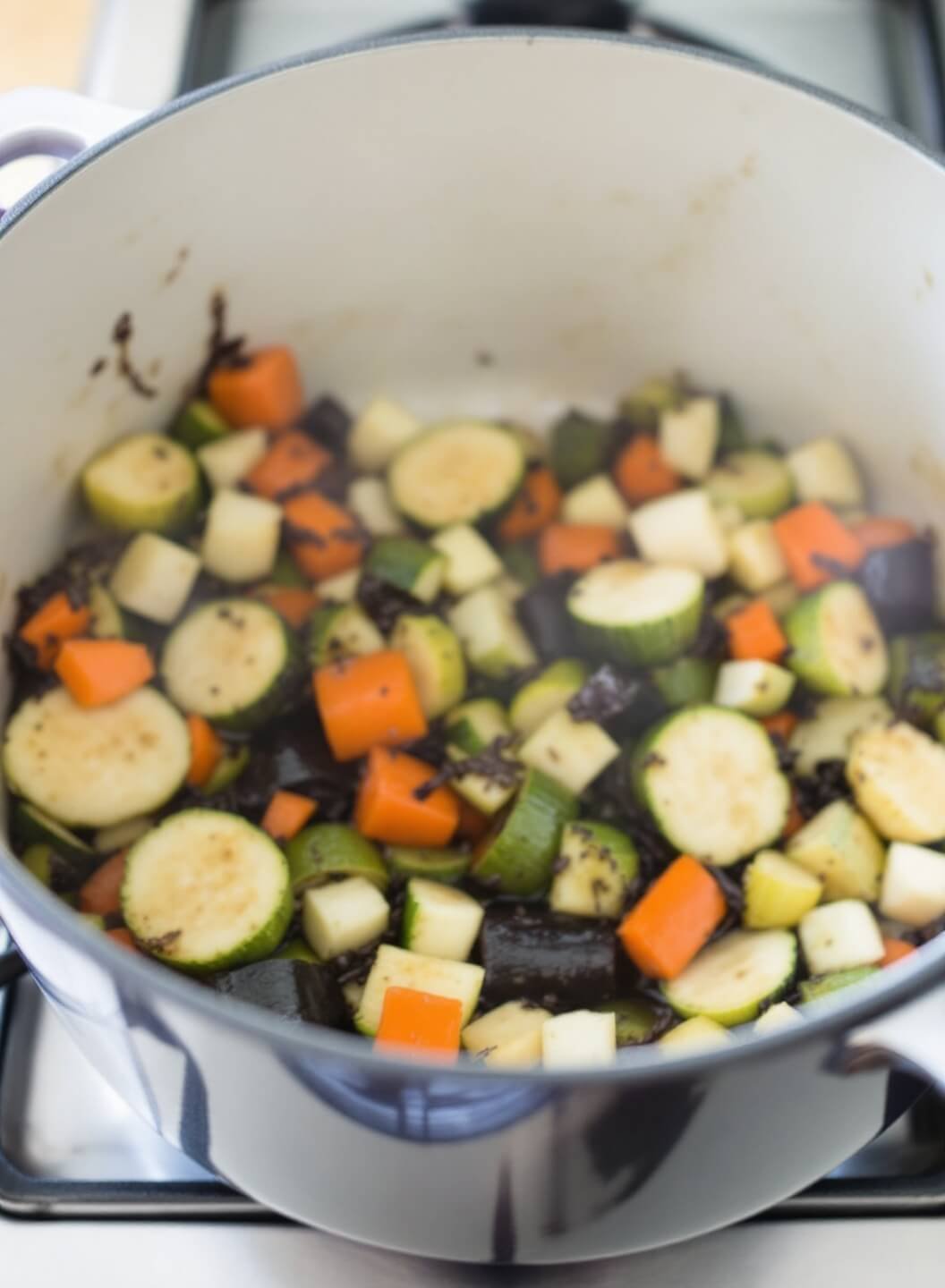 Hearty Low-Carb Beef Stew (No Potatoes) 5 Sauteed vegetables in pot being deglazed with wine