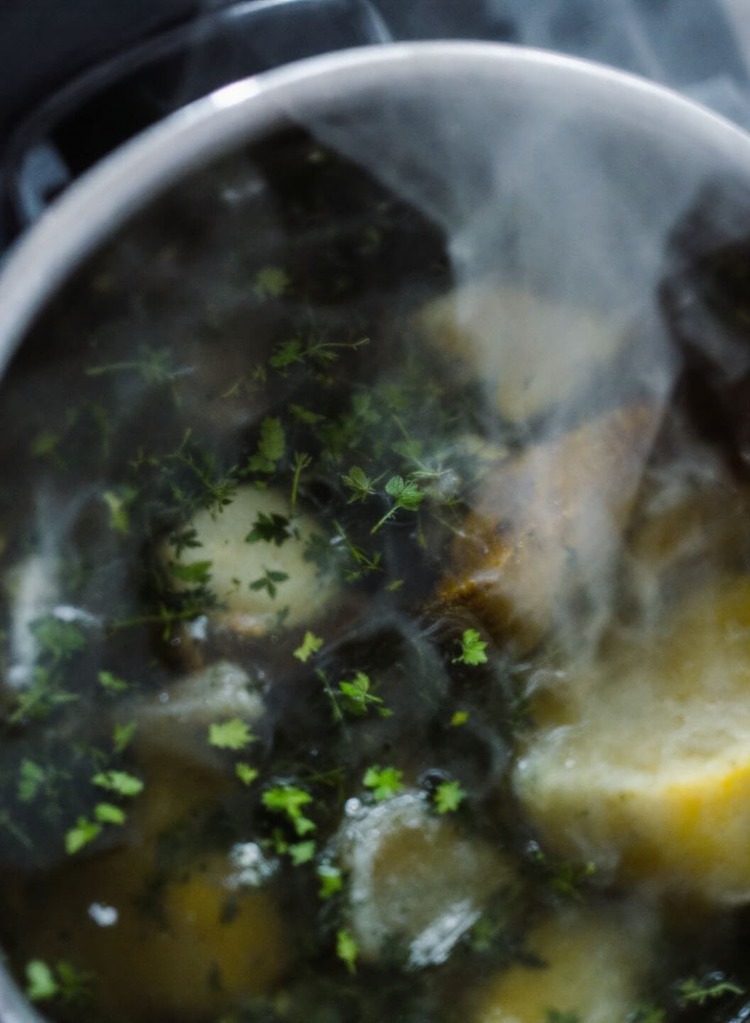 Hearty Low-Carb Beef Stew (No Potatoes) 6 Simmering stew with steam rising and herbs floating on top