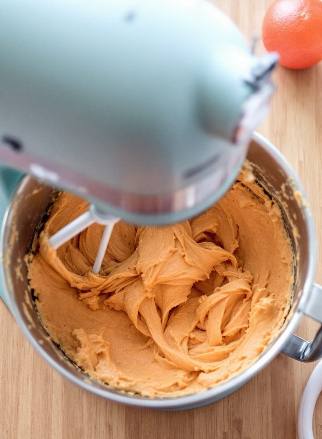 Sugar-Free Sweet Potato Casserole Using Mashed Pumpkin 4 Electric mixer blending creamy orange mixture in a mixing bowl